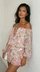 Cyrene Floral Off-Shoulder Mini Dress in Shoulder Mini Dress - Floral Pink side profile view on model