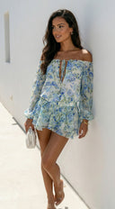 Cyrene Floral Off-Shoulder Mini Dress in Shoulder Mini Dress - Floral Green side profile view on model