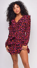 Anahi Black Floral Print Ruffle Mini Dress back view on model
